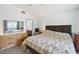 Cozy bedroom with a large bed, dresser, and serene ambiance, perfect for relaxing and unwinding at 371 Legacy Dr, Henderson, NV 89014