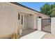 Charming front entrance features security door and manicured landscaping at 371 Legacy Dr, Henderson, NV 89014