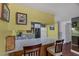 Cozy kitchen featuring a breakfast bar, stainless steel sink, and gas range at 3815 Atlantis St, Las Vegas, NV 89121