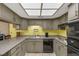 Spacious kitchen with ample cabinets, tile floors, and modern appliances at 3815 Atlantis St, Las Vegas, NV 89121