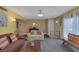Open-concept living room boasts bright walls, plush seating, and lots of natural light at 3815 Atlantis St, Las Vegas, NV 89121