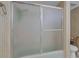 Bathroom shower with a frosted glass sliding door at 3815 Atlantis St, Las Vegas, NV 89121