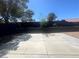 Spacious backyard featuring a concrete slab and block wall at 3920 Aspencrest Dr, Las Vegas, NV 89108
