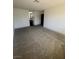 Large carpeted bedroom with an ensuite bathroom and ample closet space for maximum comfort at 3920 Aspencrest Dr, Las Vegas, NV 89108