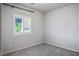 Cozy bedroom featuring carpet floors, and natural light from the window at 393 Mullen Ave, Henderson, NV 89044