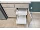Pull-out shelving adds convenience to the cabinets and countertops in the kitchen at 393 Mullen Ave, Henderson, NV 89044