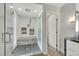 Beautiful bathroom with a walk-in shower, a glass door, and subway tile at 4143 Chela Cir, Las Vegas, NV 89120