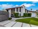 Stunning home with modern gray accents, a red tile roof, and desert landscaping at 4143 Chela Cir, Las Vegas, NV 89120