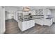Spacious kitchen with island, stainless steel appliances, and open layout at 4143 Chela Cir, Las Vegas, NV 89120
