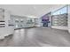 Spacious living room featuring a fireplace, large windows, and tile flooring at 4143 Chela Cir, Las Vegas, NV 89120