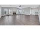 Spacious living room with tile floors, a fireplace, and plenty of natural light at 4143 Chela Cir, Las Vegas, NV 89120