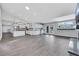 Bright and open-concept living space with tiled floors and recessed lighting at 4143 Chela Cir, Las Vegas, NV 89120