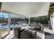Inviting covered patio featuring stylish furniture and a view of the sparkling pool, perfect for outdoor entertaining at 4143 Chela Cir, Las Vegas, NV 89120