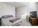 Bedroom with large window and carpet floors at 42 Late Harvest Ave, Pahrump, NV 89060