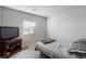 Cozy bedroom with natural light and carpeted floors at 42 Late Harvest Ave, Pahrump, NV 89060