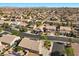 A neighborhood showcases well-maintained homes, manicured lawns, and a sense of community at 4308 Brazil Palm Ct, North Las Vegas, NV 89032