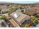Aerial view of home featuring solar panels and covered patio at 4308 Brazil Palm Ct, North Las Vegas, NV 89032