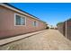Backyard with gravel side yard at 4308 Brazil Palm Ct, North Las Vegas, NV 89032