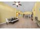 Open-concept dining area featuring tile floors and a view of the kitchen at 4308 Brazil Palm Ct, North Las Vegas, NV 89032