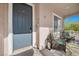 Cozy front porch with seating area and charming decor, inviting entry at 4308 Brazil Palm Ct, North Las Vegas, NV 89032