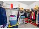 Spacious walk-in closet with ample shelving, hanging racks, and storage space for clothes and accessories at 4308 Brazil Palm Ct, North Las Vegas, NV 89032