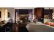 Modern bedroom suite with sleek furniture and a panoramic city view from the large window at 4381 W Flamingo Rd # 1508, Las Vegas, NV 89103