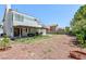 Large backyard featuring a covered patio and ample space for outdoor activities and landscaping at 459 Kelsford Dr, Las Vegas, NV 89123