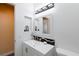 Bright bathroom featuring a sleek vanity, modern fixtures, and decorative touches throughout the space at 459 Kelsford Dr, Las Vegas, NV 89123