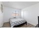 Bedroom featuring wood-look flooring, closet with sliding doors, and a window at 459 Kelsford Dr, Las Vegas, NV 89123