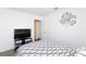 Bedroom with wood-look flooring and television at 459 Kelsford Dr, Las Vegas, NV 89123