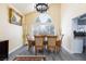 A formal dining room features high ceilings, elegant decor and access to the kitchen at 459 Kelsford Dr, Las Vegas, NV 89123