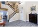 A home foyer features high ceilings, a view of the staircase and modern flooring at 459 Kelsford Dr, Las Vegas, NV 89123
