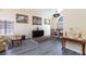 A formal living room and dining room combination features large windows and elegant decor at 459 Kelsford Dr, Las Vegas, NV 89123