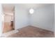 A small bedroom with neutral walls and carpet flooring at 4610 Lime Straight Dr, Las Vegas, NV 89115