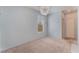 A cozy bedroom with neutral walls, carpet flooring, and natural light at 4610 Lime Straight Dr, Las Vegas, NV 89115