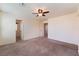 Spacious bedroom features neutral carpeting, ceiling fan and convenient access to ensuite bath and walk-in closet at 4610 Lime Straight Dr, Las Vegas, NV 89115