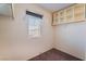 Walk-in closet with window, shelving and hanging rod for organizing clothes and accessories at 4610 Lime Straight Dr, Las Vegas, NV 89115