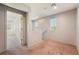 Hallway with carpet and access to several rooms at 4610 Lime Straight Dr, Las Vegas, NV 89115