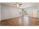 Spacious living room with tile flooring, ceiling fan, recessed lighting, and sliding patio door at 4610 Lime Straight Dr, Las Vegas, NV 89115