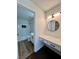 Bright bathroom vanity and walk in closet boast modern fixtures and ample storage at 5260 Mission Monterey Ln # 208, Las Vegas, NV 89107