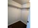 Empty walk-in closet with brown carpeting and white shelving at 5260 Mission Monterey Ln # 208, Las Vegas, NV 89107