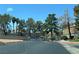 Gated community entrance with lush landscaping ensures privacy and security at 5260 Mission Monterey Ln # 208, Las Vegas, NV 89107