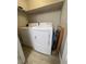 Laundry room with white washer and dryer and a shelf for storage at 5260 Mission Monterey Ln # 208, Las Vegas, NV 89107