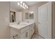 Contemporary bathroom with double vanity and stylish lighting at 5299 Silver Branch Ave, Las Vegas, NV 89118