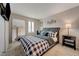 Comfortable bedroom featuring a stylish bed frame and plush bedding at 5299 Silver Branch Ave, Las Vegas, NV 89118