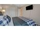 Relaxing bedroom featuring neutral tones and comfortable furnishings at 5299 Silver Branch Ave, Las Vegas, NV 89118
