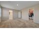 Bright bedroom with neutral walls, recessed light fixture, en suite bathroom and walk-in closet at 5299 Silver Branch Ave, Las Vegas, NV 89118