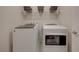 Functional laundry area featuring a modern washer and dryer at 5299 Silver Branch Ave, Las Vegas, NV 89118