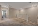 Bright and spacious loft area with neutral tones, plush carpeting, and ample natural light at 5299 Silver Branch Ave, Las Vegas, NV 89118