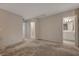 Versatile open loft area, showcasing neutral color schemes and access to various rooms at 5299 Silver Branch Ave, Las Vegas, NV 89118